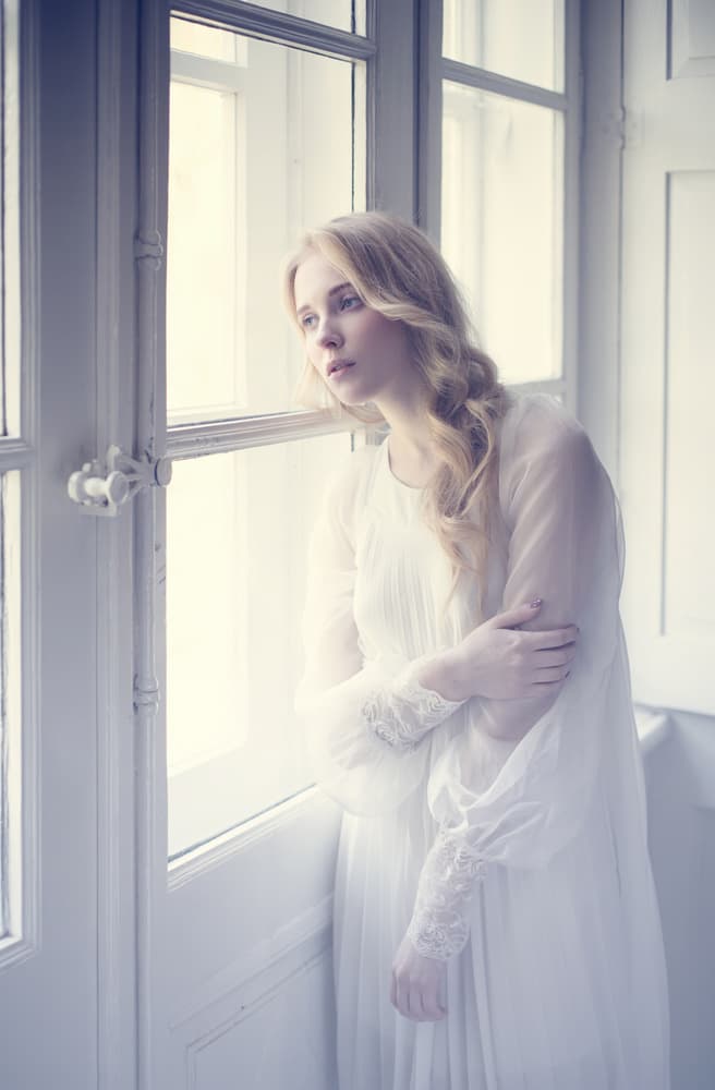 Pensive Woman by Window by Dorota Gorecka — canvas wall art