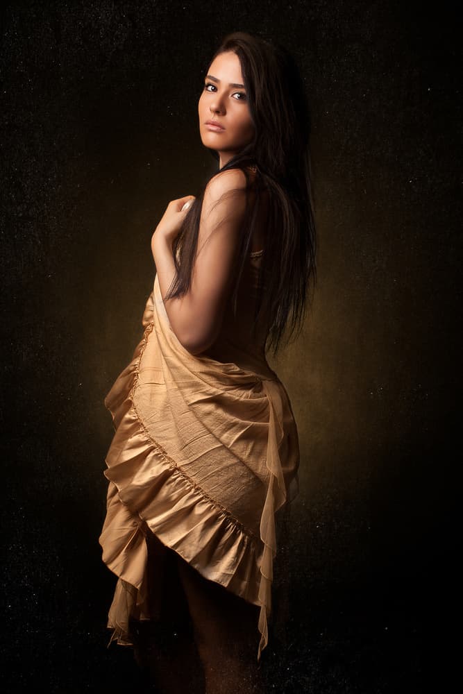 Elegant Woman in Gold by Mehdi Mokhtari — canvas wall art