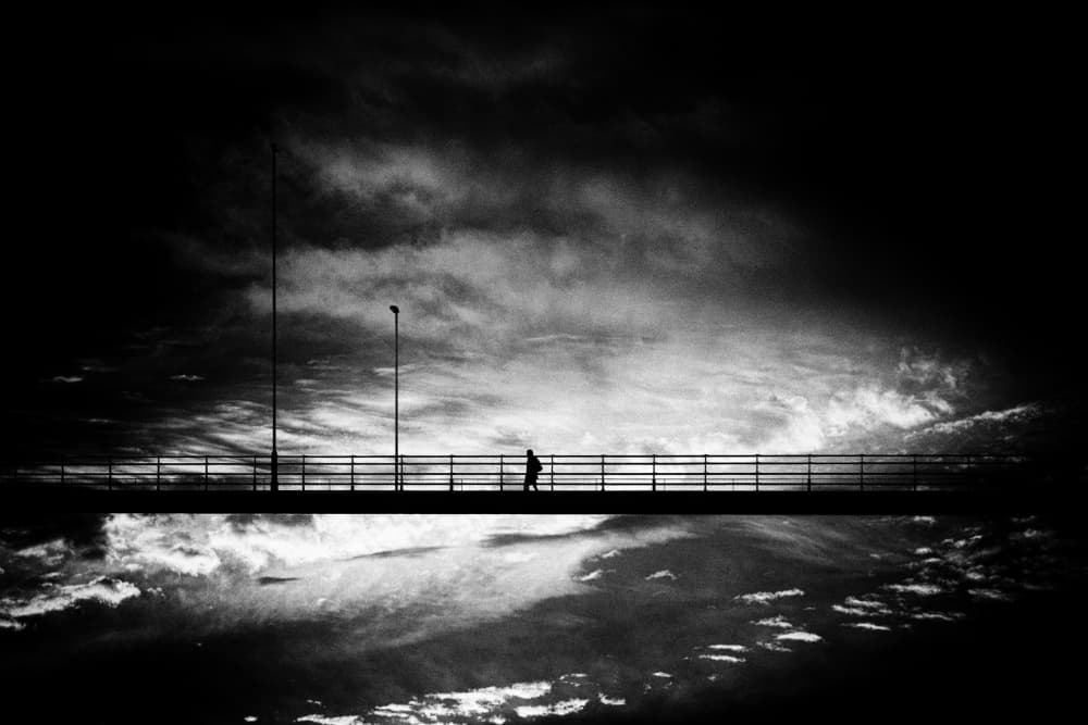 Solitary Figure on Bridge by Dave Quince — canvas wall art
