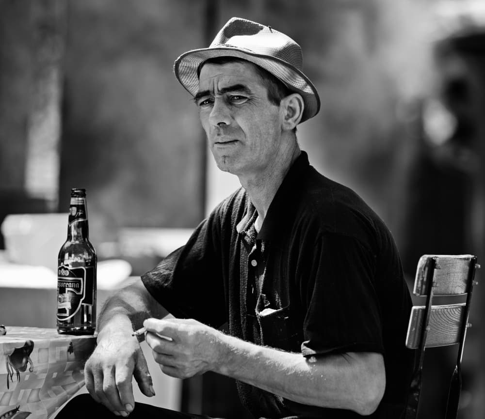 Thoughtful Man in Hat by Julien Oncete — canvas wall art