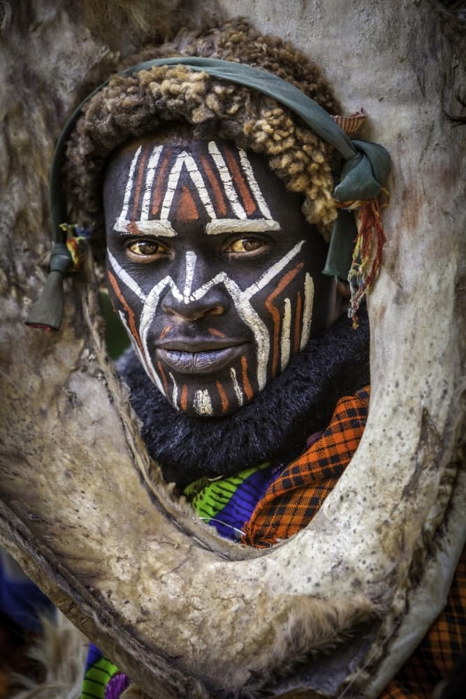 Tribal Face Paint Portrait by Ali Khataw — canvas wall art