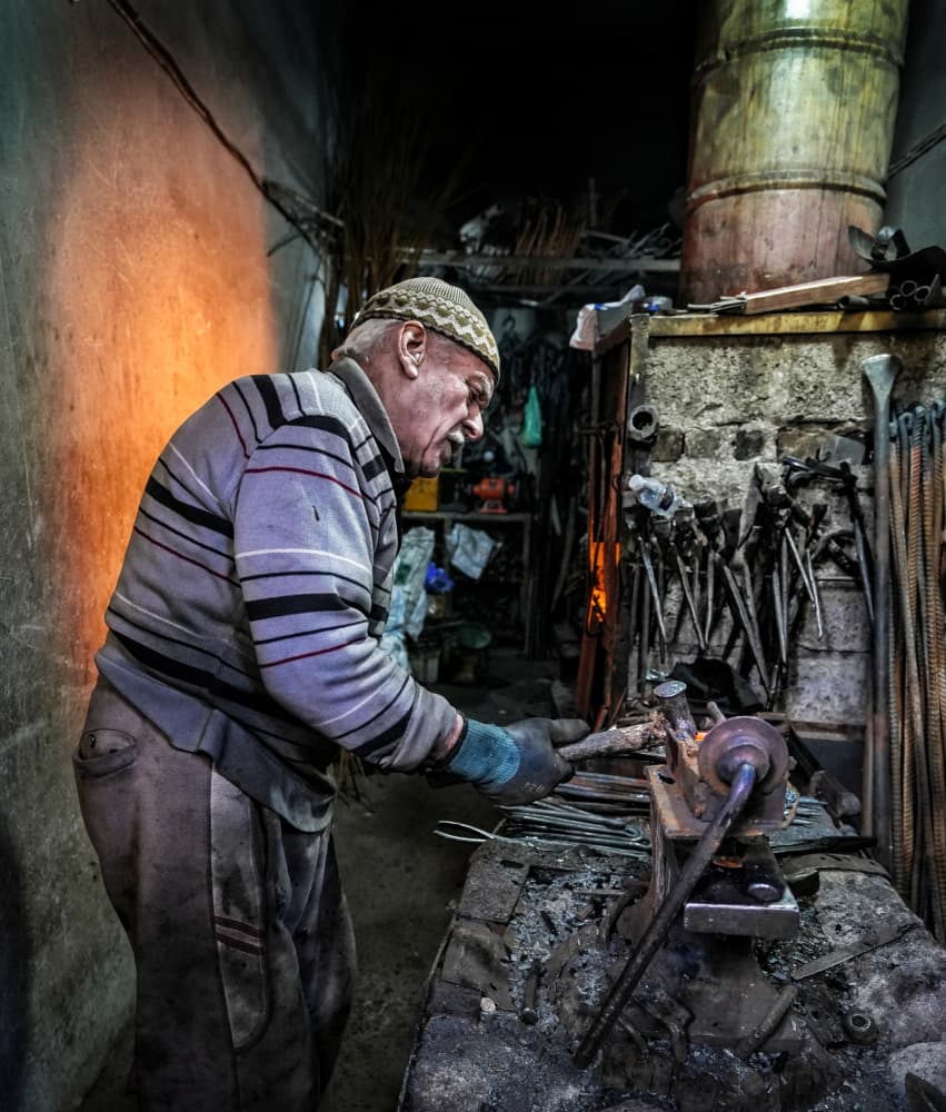 Blacksmith At Work by Bashar Alsofey — canvas wall art
