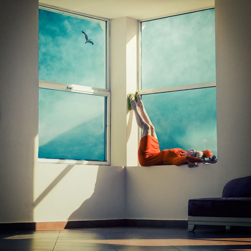 Legs Up Window View by ambra — canvas wall art
