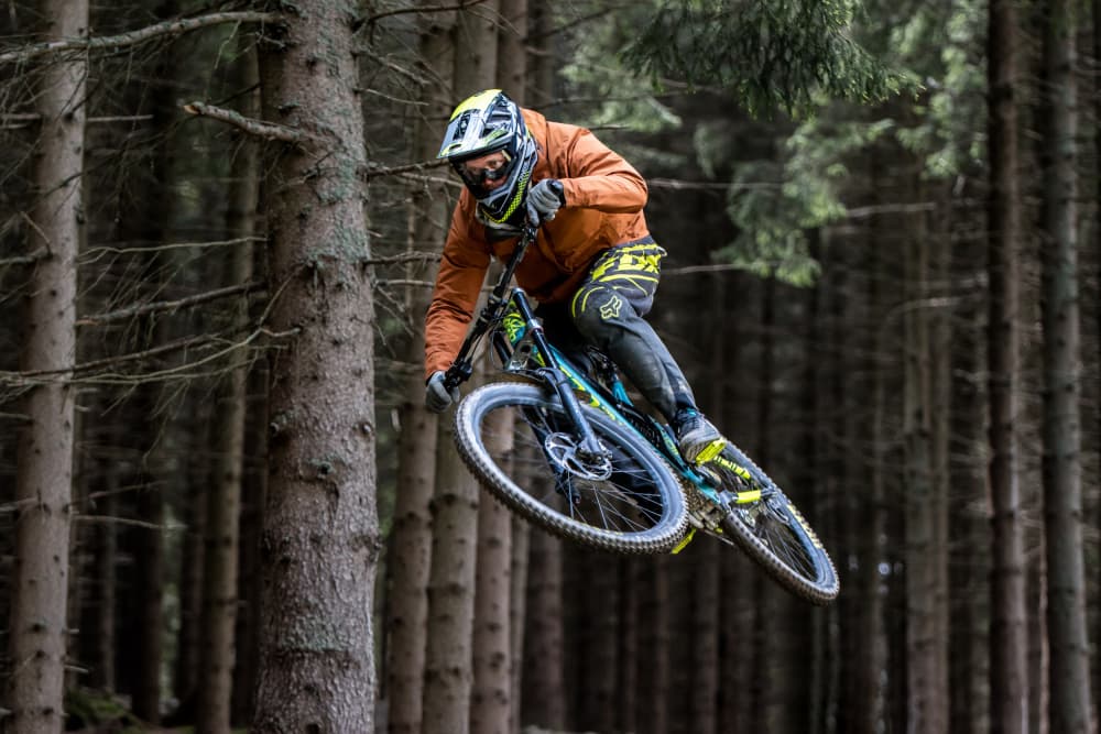 Forest Mountain Bike Jump by Daniel Klement — canvas wall art