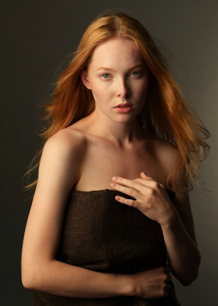 Contemplative Redhead Portrait by Yoram GIL — canvas wall art