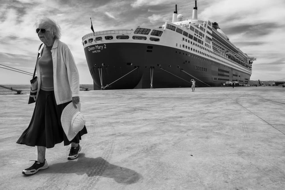 Elderly Traveler Big Ship by Luis Sarmento — canvas wall art
