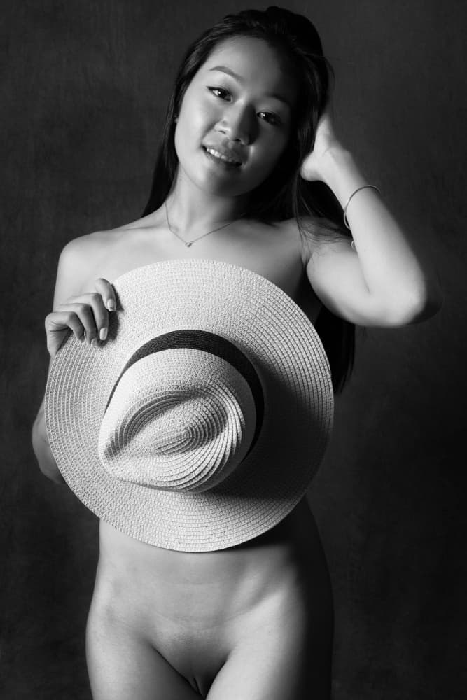 Alluring Woman Hat by David McCracken — canvas wall art
