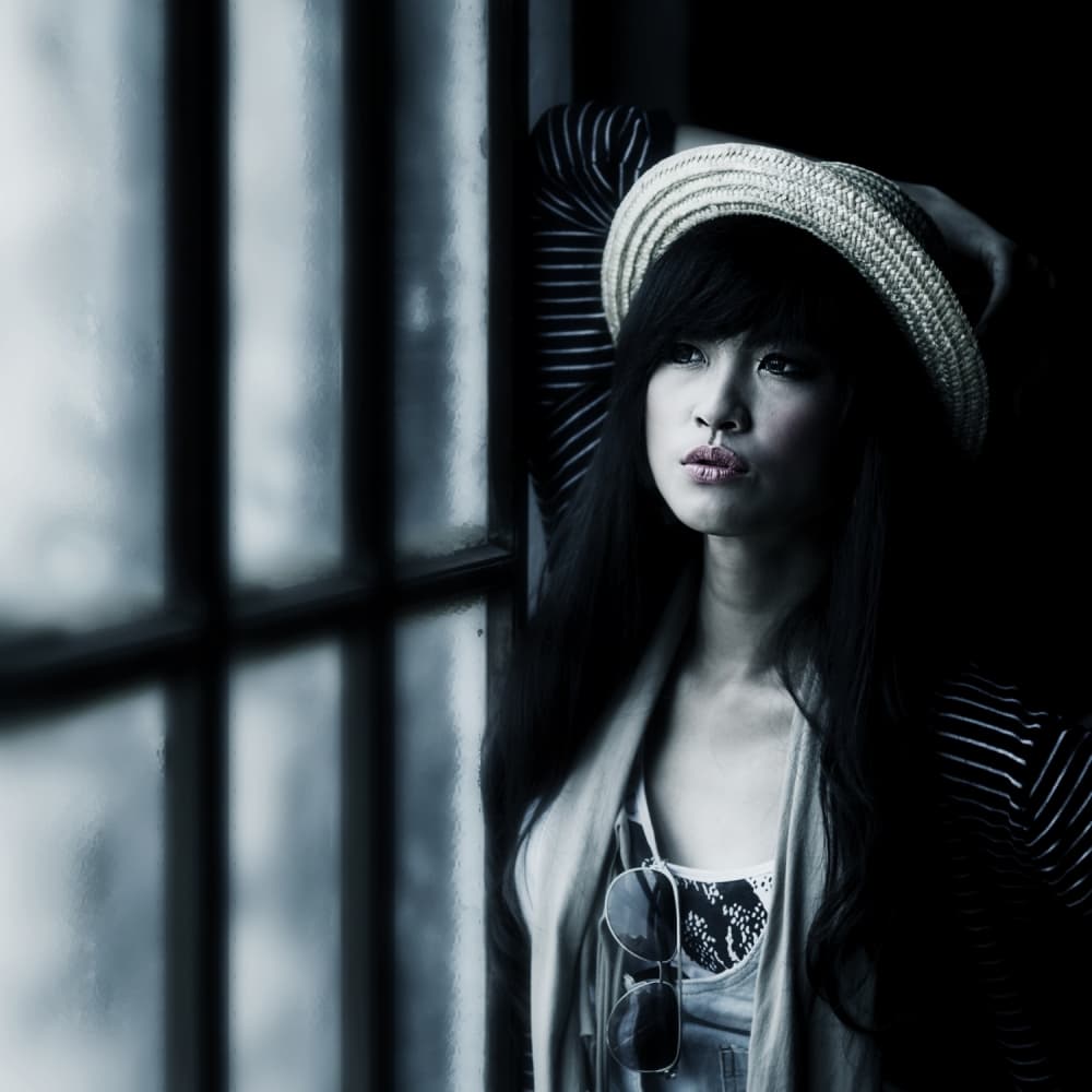 Pensive Woman By Window by Sebastian Kisworo — canvas wall art
