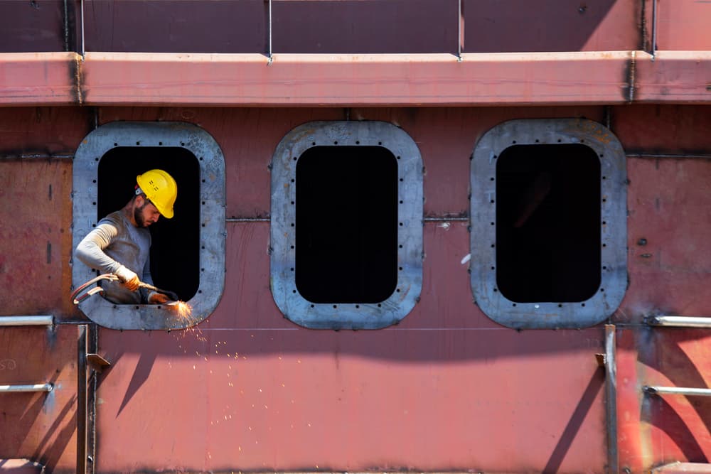 Shipyard Worker Welding by Suleyman Uzumcu — canvas wall art
