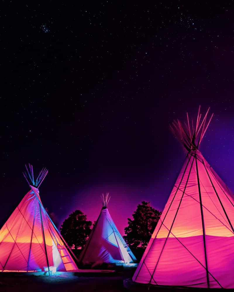Vaporwave Teepees Glowing at Night Under Stars In Marfa Texas by Tom Windeknecht — canvas wall art