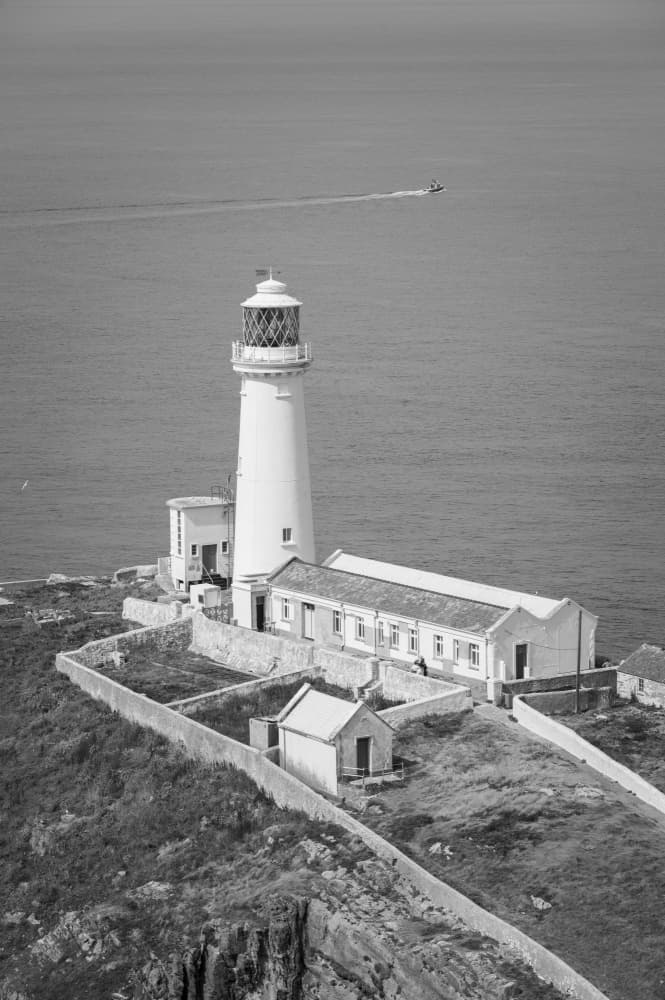 Classic Coastal Lighthouse by Christa Stroo — canvas wall art