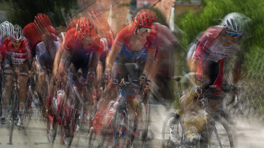 Speeding Cyclists by Milan Malovrh — canvas wall art