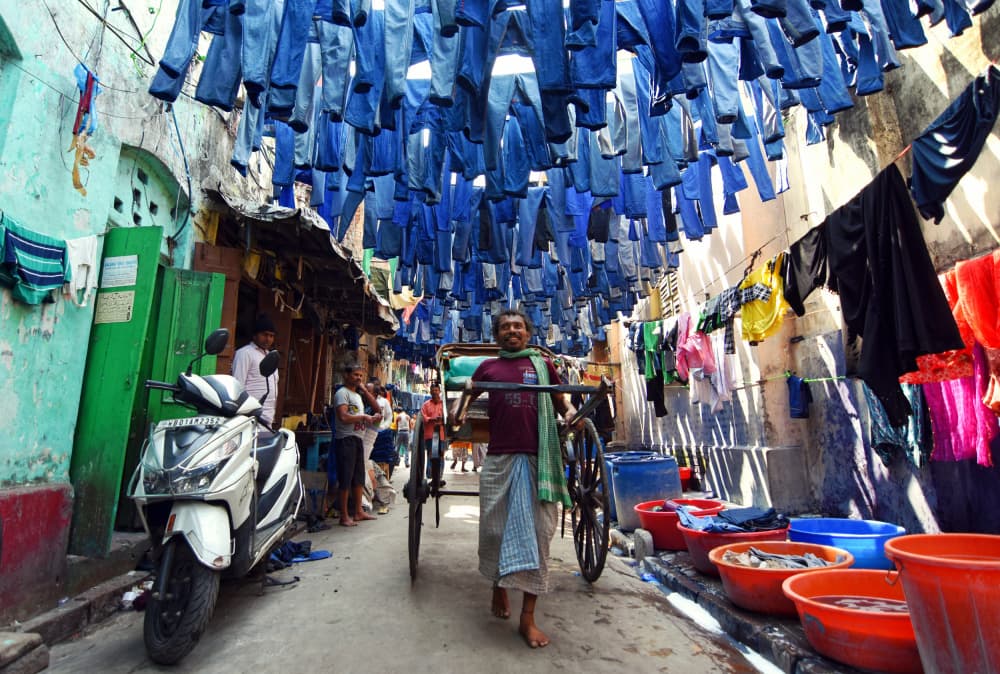 Blue Jeans Laundry Street by Ajit Kumar Majhi — canvas wall art