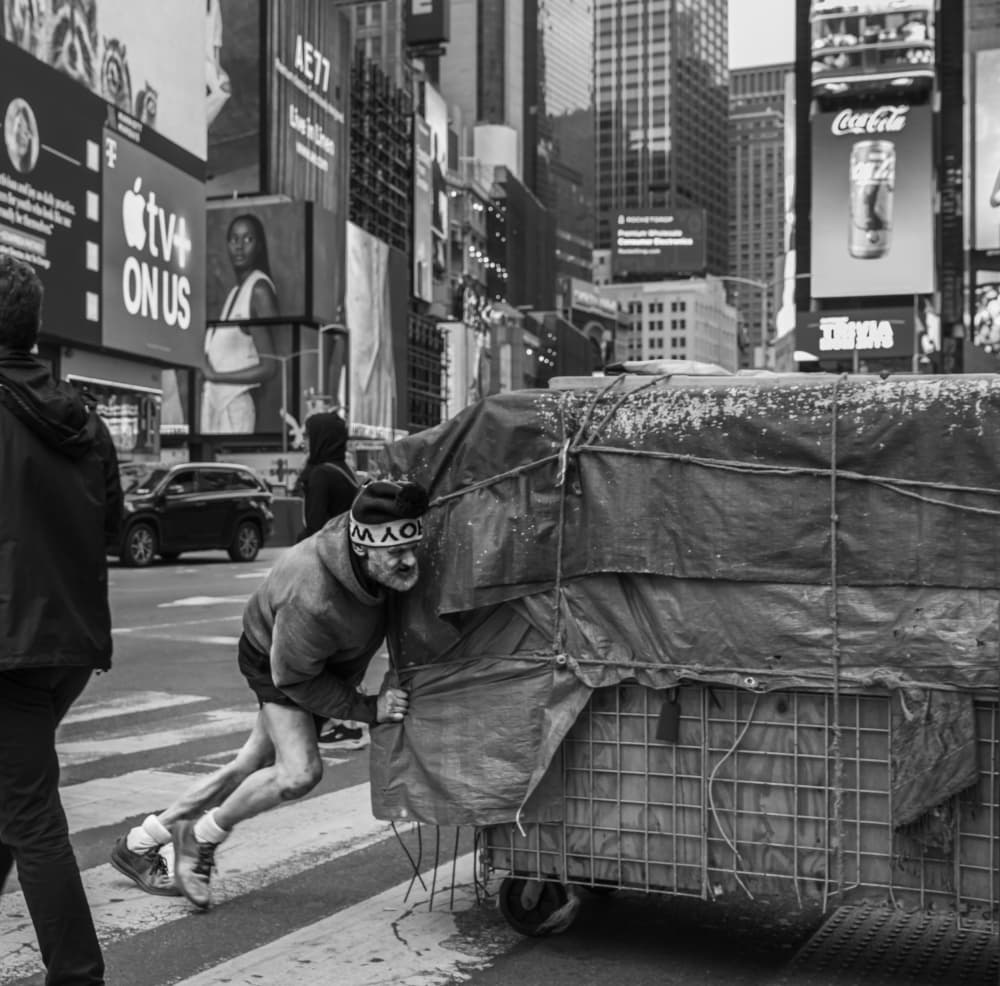 Man Pushing Heavy Cart by Tong Zhang — canvas wall art
