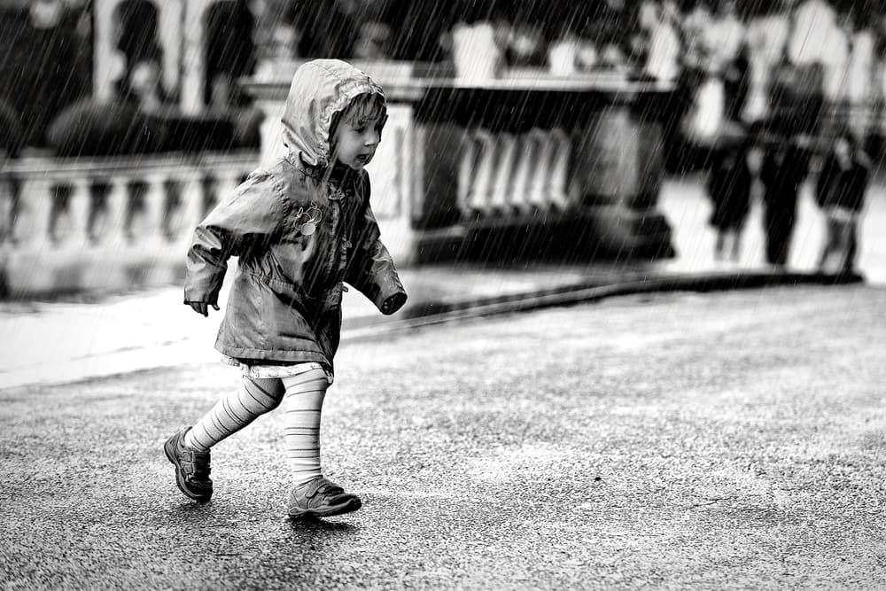 Child In Rain by Marcel Rebro — canvas wall art