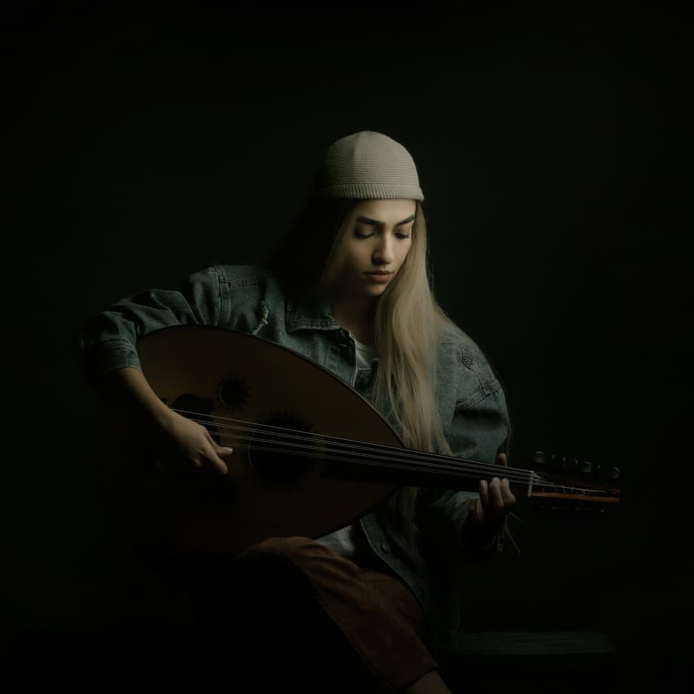 Thoughtful Oud Player by Moein Hasheminasab — canvas wall art