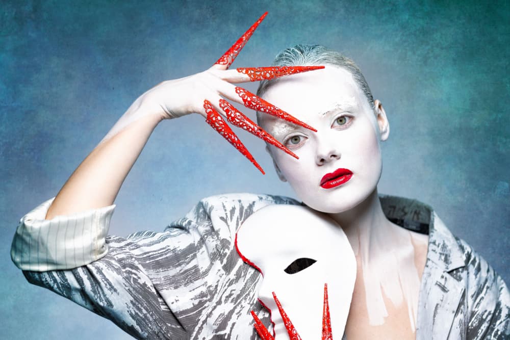 White Mask Red Nails by Amnon Eichelberg — canvas wall art