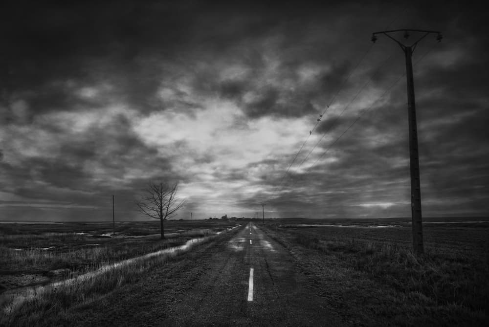Lonely Road Under Dark Clouds by Jose C. Lobato — canvas wall art