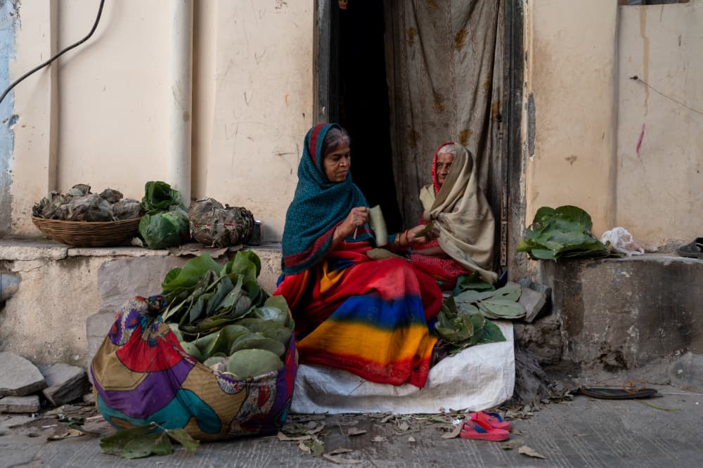 Indian Women Outside Door by Ilana Lam — canvas wall art