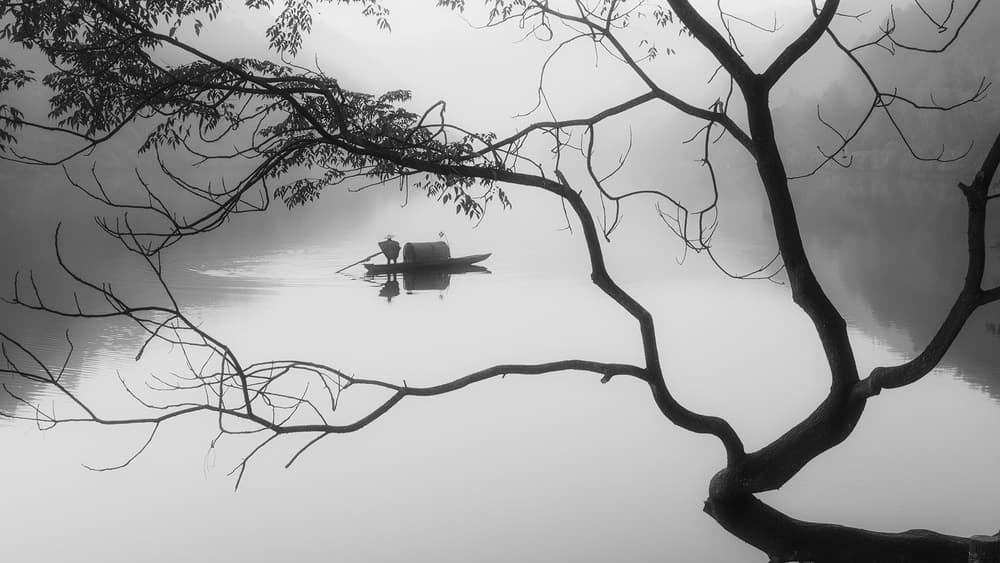 Lone Boatman Mist by Bingo Z — canvas wall art