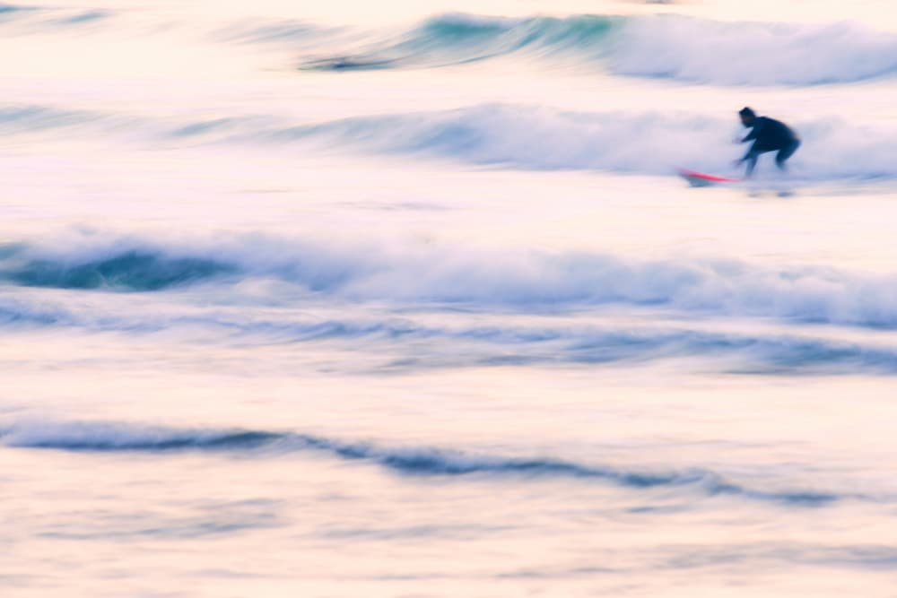 Dreamlike Ocean Surfer by Tal Paz-Fridman — canvas wall art