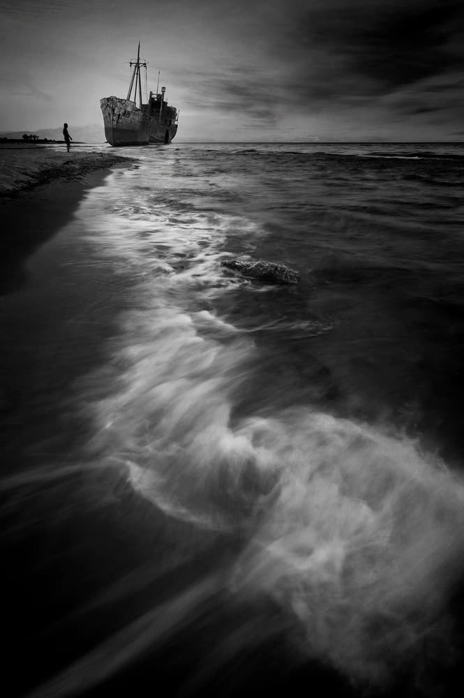 Solitary Shipwreck Beach by Chris Kaddas — canvas wall art