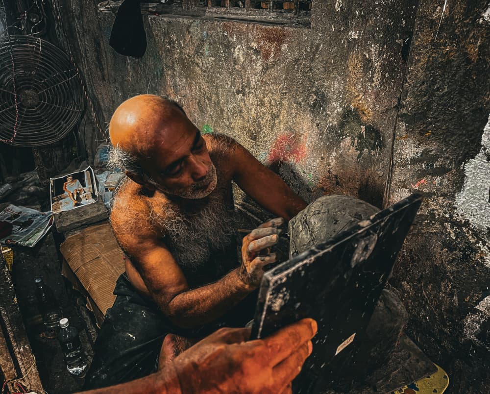 Sculptor at Work by Subhajit Das — canvas wall art