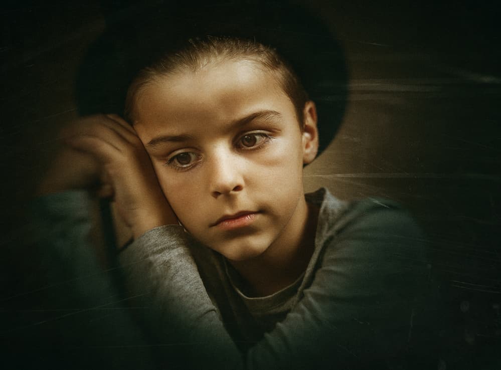 Pensive Young Boy by Amir Bajrich — canvas wall art