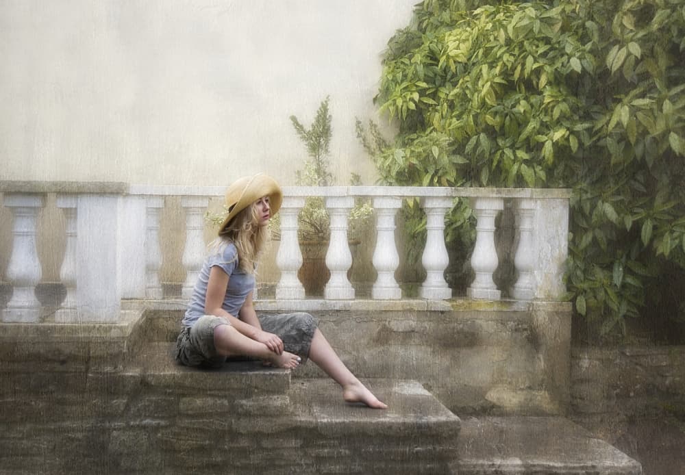 Pensive Girl Straw Hat by kenp — canvas wall art
