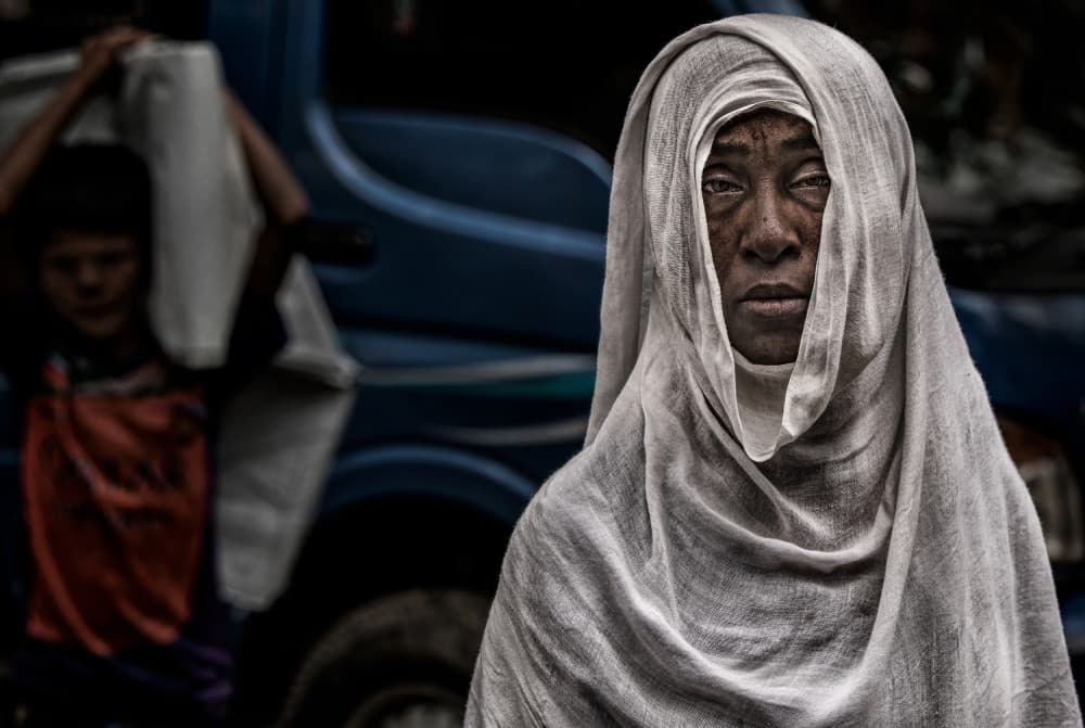 Solemn Woman's Gaze by Joxe Inazio Kuesta Garmendia — canvas wall art