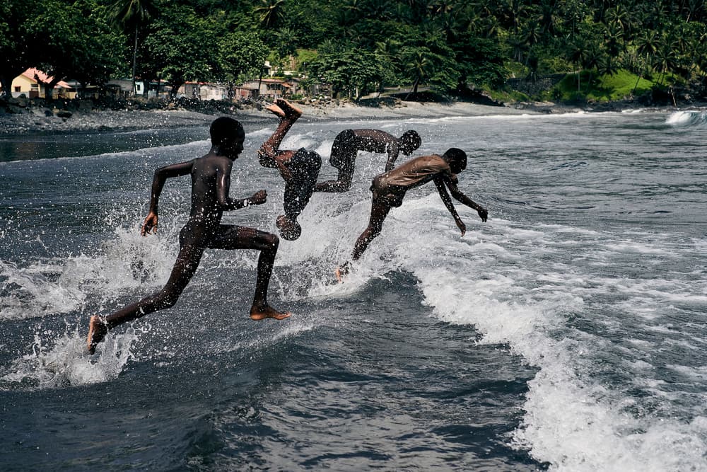 Kids Running in Waves by Luís Godinho — canvas wall art