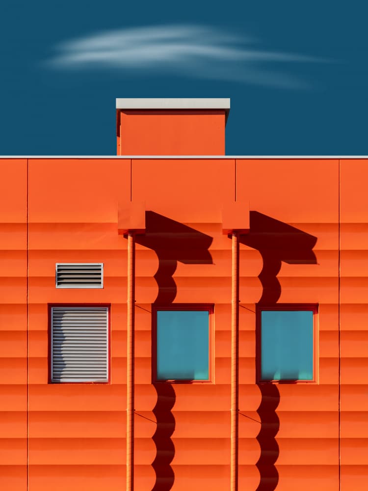 Orange Building Shadows by Andrea Comari — canvas wall art