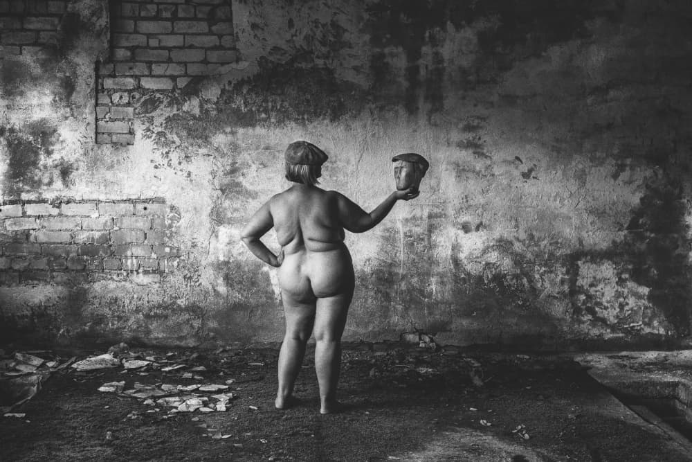 Nude Woman Holding Hat by Normunds Kaprano — canvas wall art