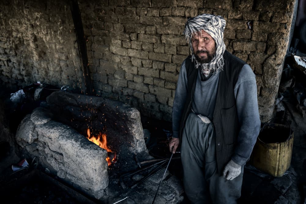Traditional Blacksmith At Forge by Trevor Cole — canvas wall art
