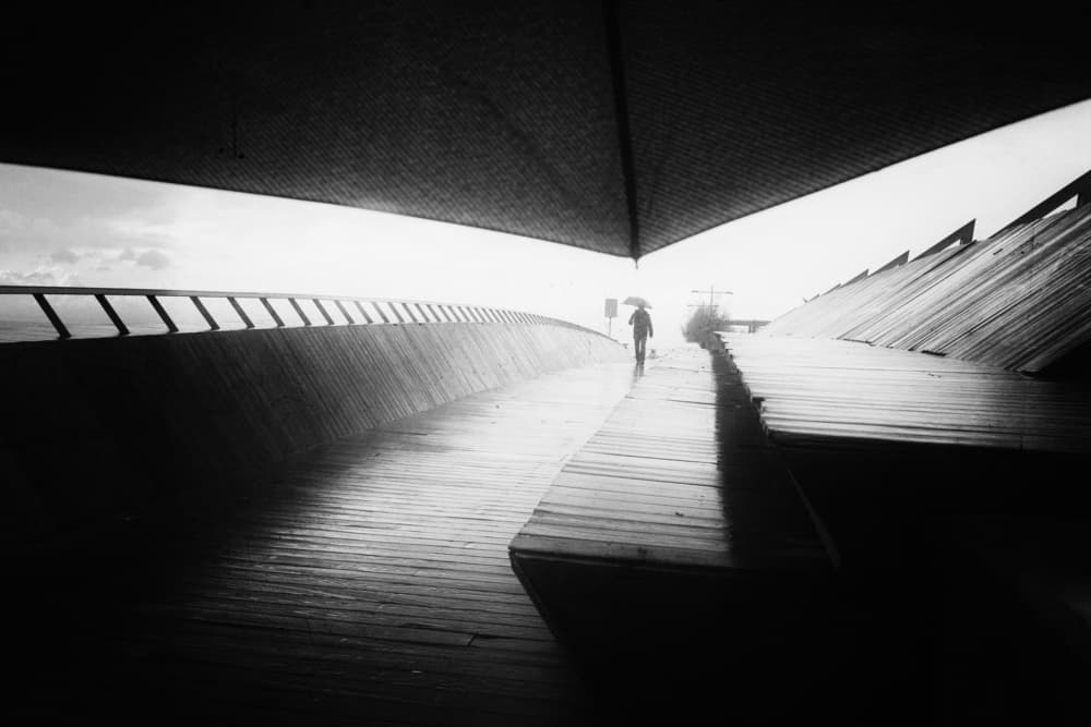 Lone Figure Rainy Path by Ali Ayer — canvas wall art