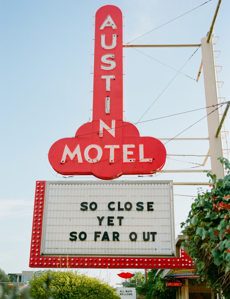Austin Motel Neon Sign by Bethany Young — canvas wall art