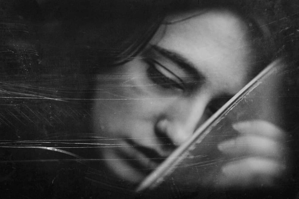 Pensive Woman With Quill by Bogdan Bouşcă — canvas wall art
