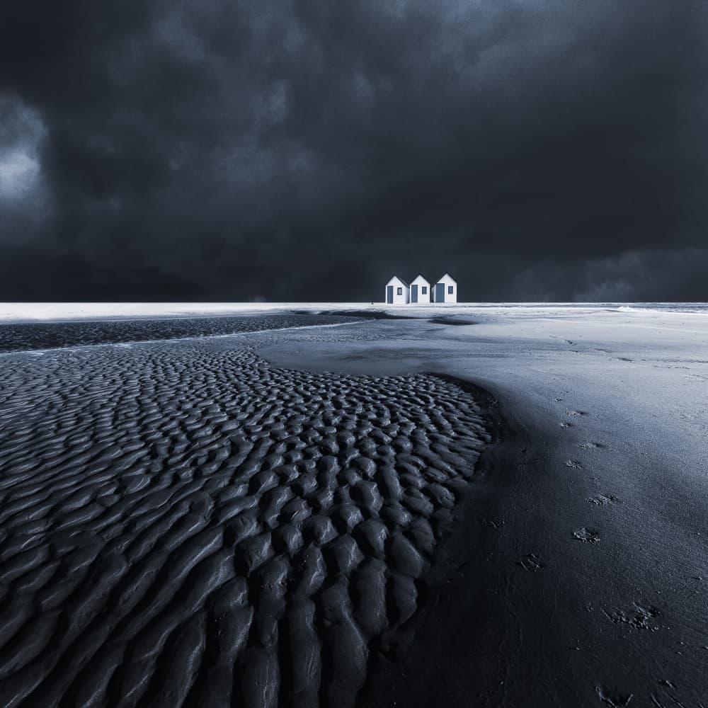 Moody Beach Huts by Uschi Hermann — canvas wall art