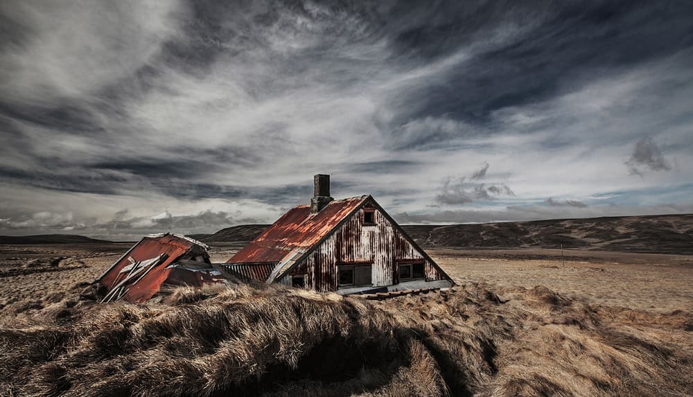Weathered House Moody Sky by Bragi Ingibergsson - BRIN — canvas wall art