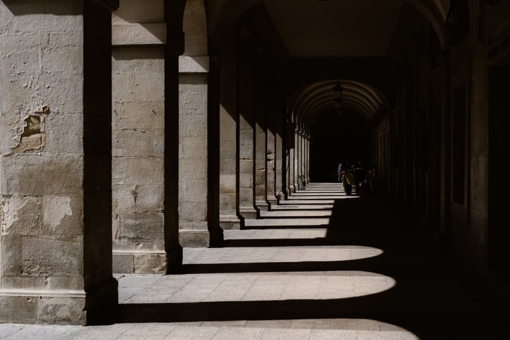 Shadowed Stone Archway by Aimee Giles — canvas wall art