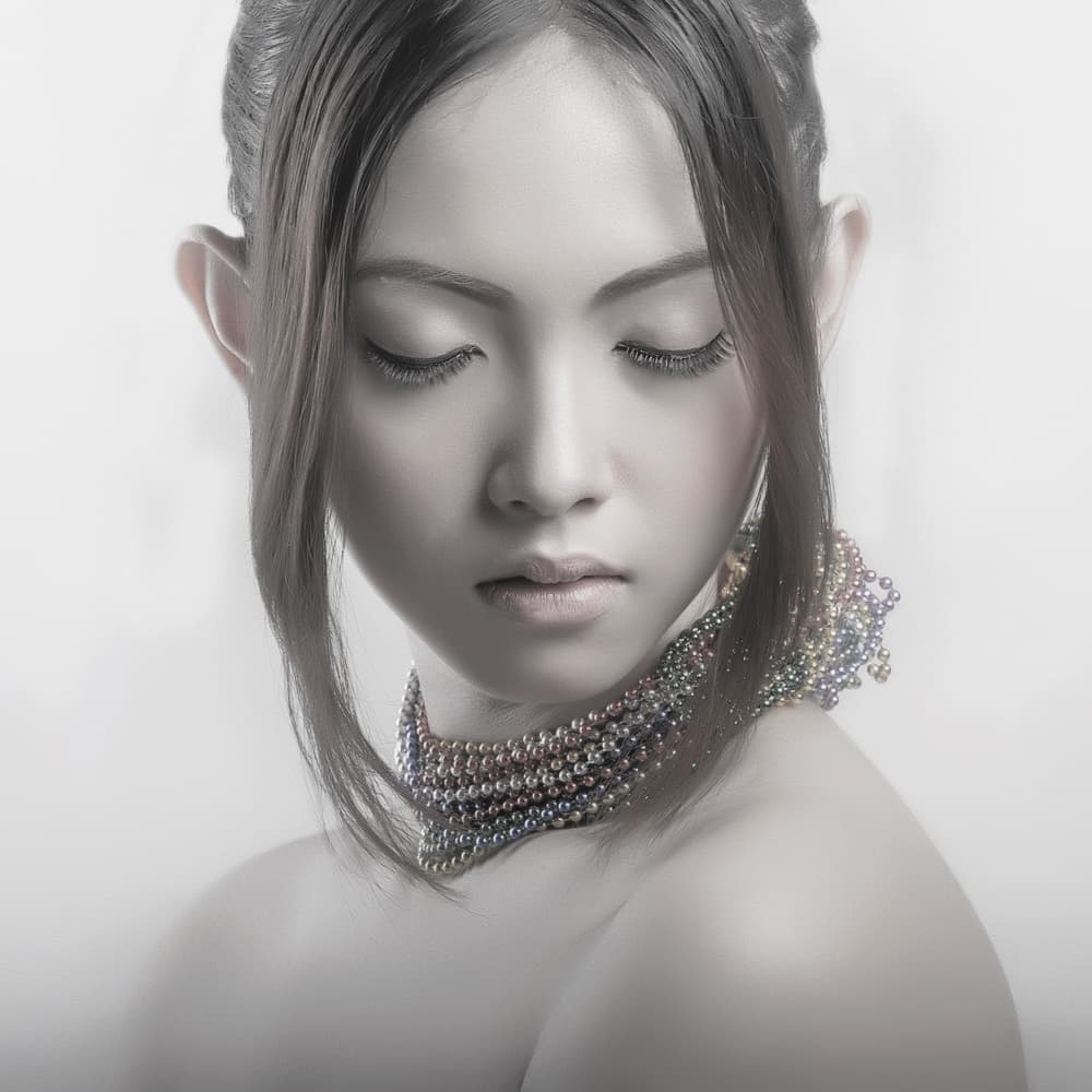 Serene Beaded Portrait by Arief Siswandhono — canvas wall art