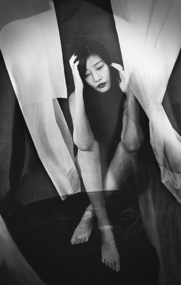 Pensive Woman In Shadow by cindy ahn — canvas wall art