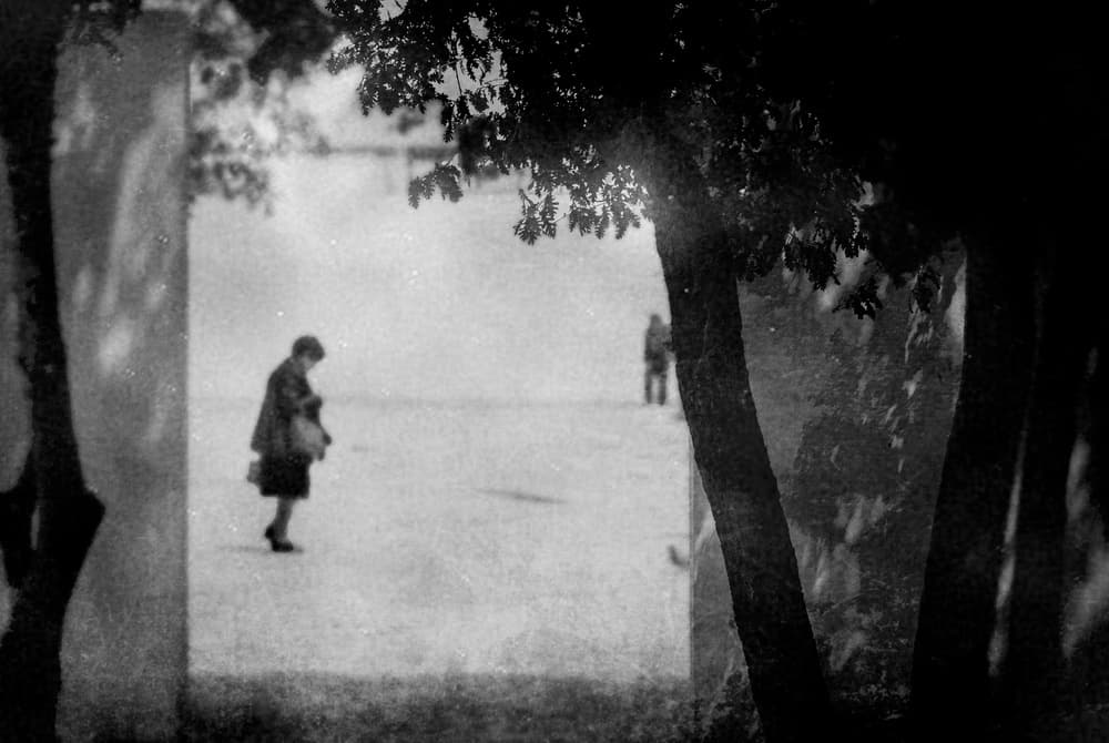 Solitary Figure Walking by Milena Seita — canvas wall art