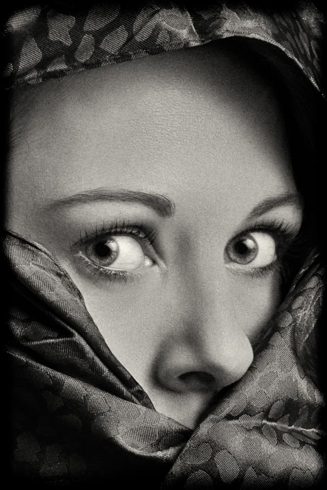 Woman's Enigmatic Gaze by Jan Slotboom — canvas wall art