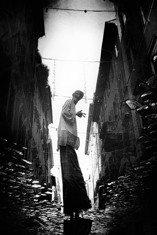 Smiling Stilt Walker Alley by Antonio Grambone — canvas wall art