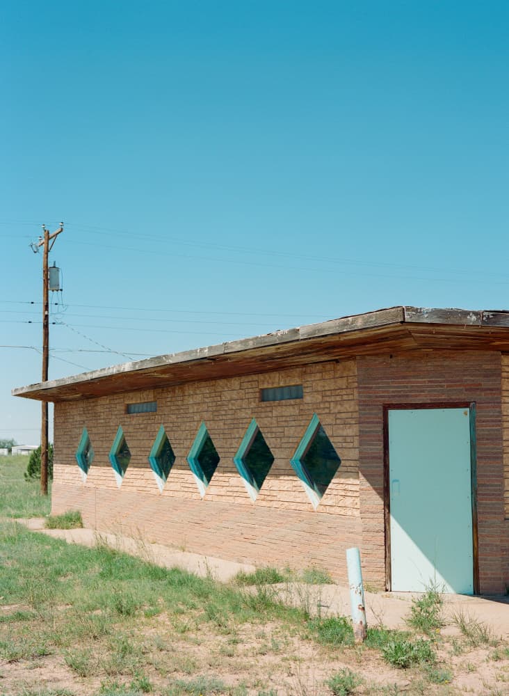 Desert Brick Building by Bethany Young — canvas wall art