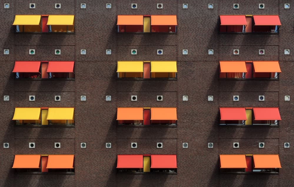 Sunny Geometric Facade by Huib Limberg — canvas wall art