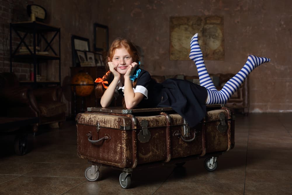 Playful Redhead On Trunk by Victoria Glinka — canvas wall art