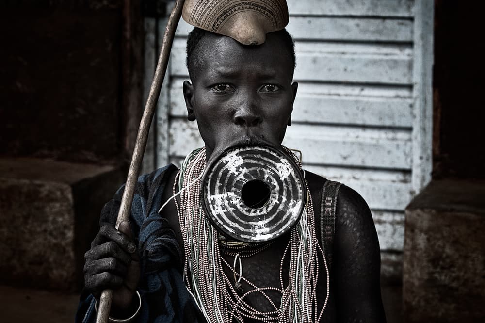 Mursi Man Lip Plate Portrait by Joxe Inazio Kuesta Garmendia — canvas wall art