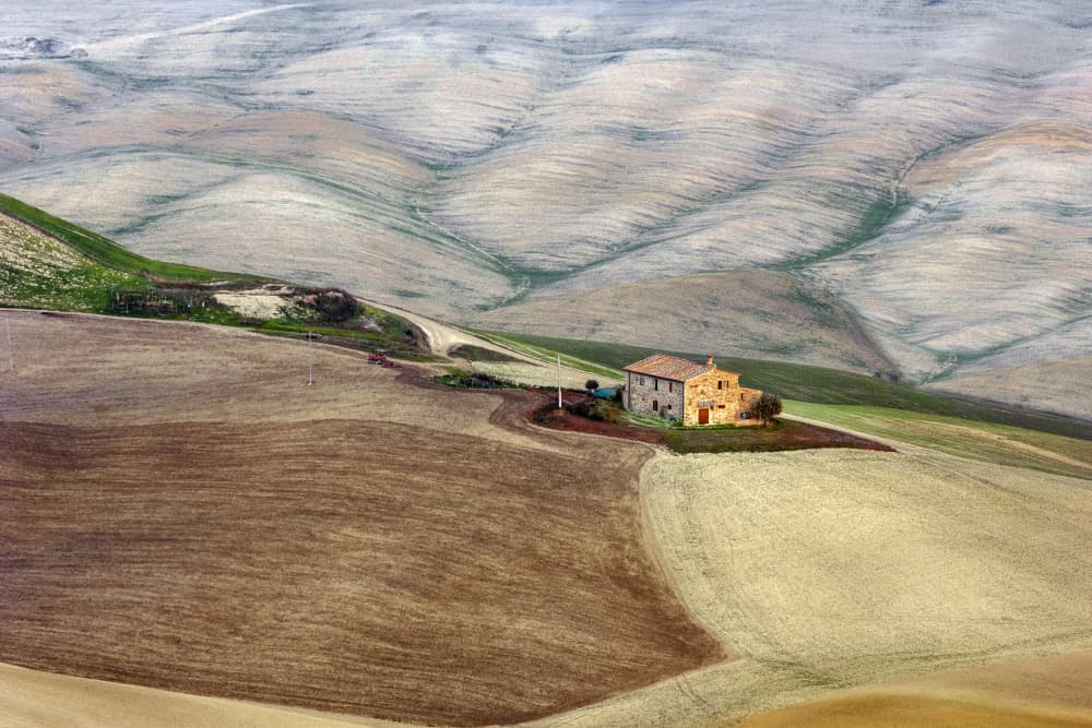 Peaceful Farmhouse Landscape by Jure Kravanja — canvas wall art